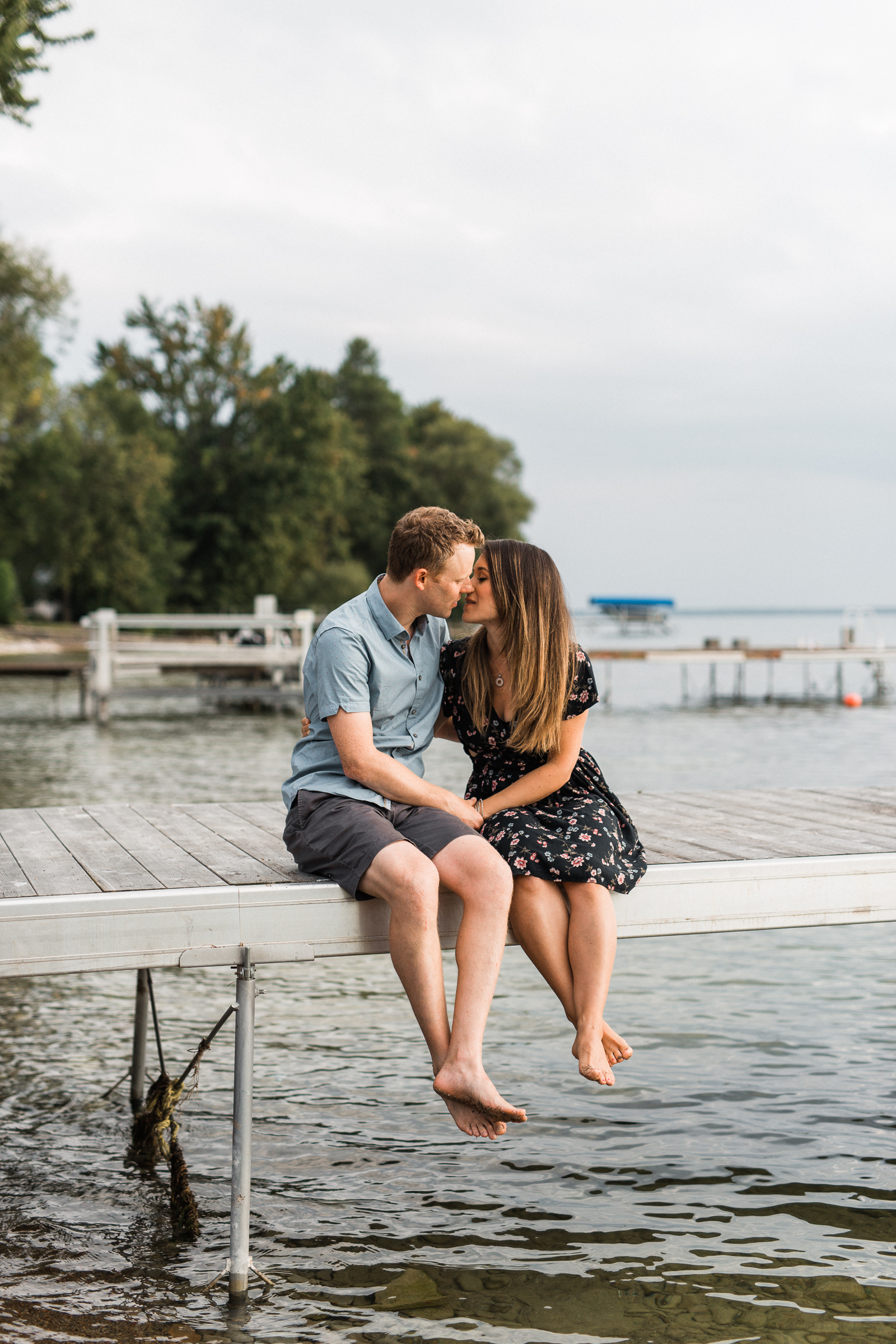 couple on dock muskoka photographer